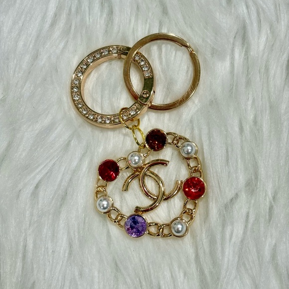 CC Stamped Gold Keychain with Red and Purple Accents - Picture 1 of 1